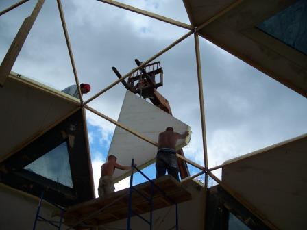 setting dome panel into place skylight